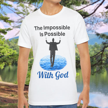 Soft, breathable Bella+Canvas t-shirt made from preshrunk cotton with “Impossible Man” design message, “The Impossible Is Possible With God,” inspirational shirt encouraging bold faith to step out and follow God into the impossible, man in white t-shirt
